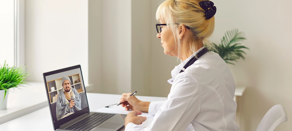 doctor checking patient on online video call