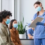 patients sitting in walk in clinic
