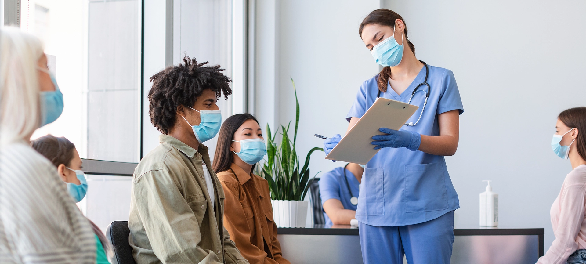 patients sitting in walk in clinic