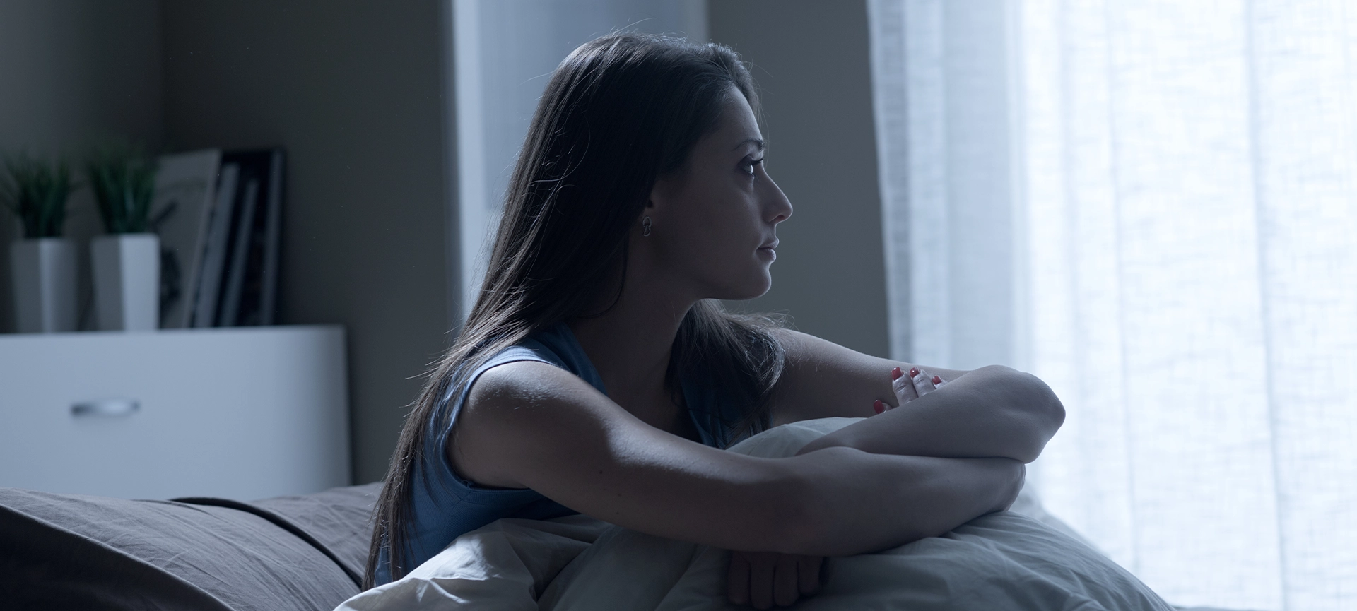 Portrait of a young woman suffering from insomnia